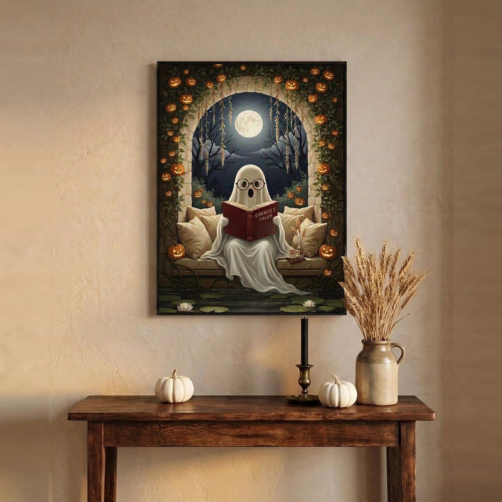 Pumpkin Arch Wall Art, A small ghost in round glasses reading in a pumpkin-lit arch, lilies on the water and a willow moon behind.